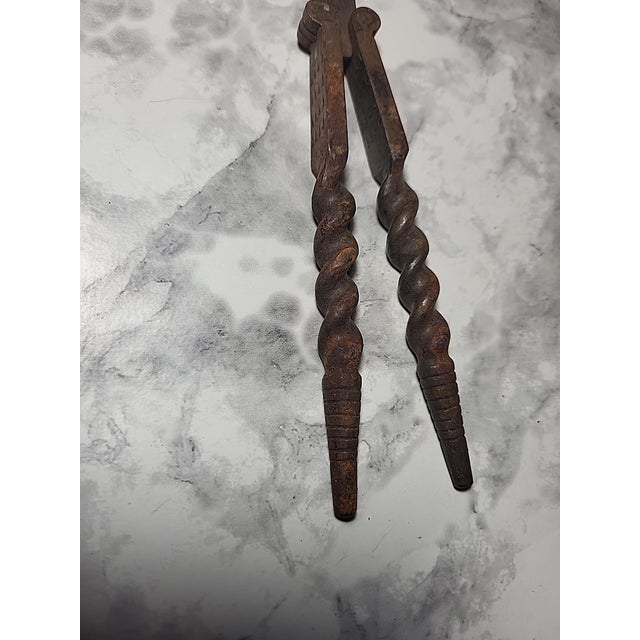 A very unusual antique nutcracker. Completely handmade - twisted cast iron.