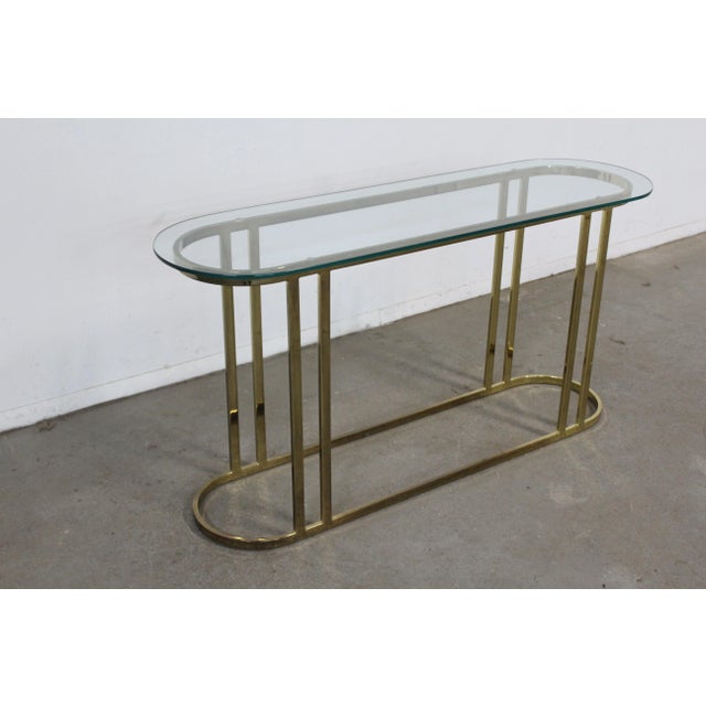 Mid Century Hollywood Regency Eliptical Brass Sofa/Hall/Console Table Offered is a piece of time and design a Mid Century...