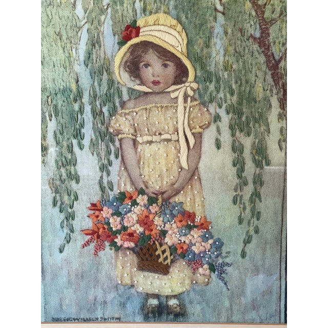 This vintage needlepoint fiber textile art features a beautiful framed Victorian crewel design handsewn with a floral...