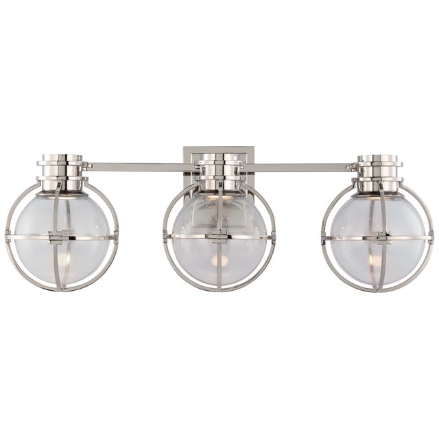 Gracie Triple Sconce in Polished Nickel with Clear Glass Designer: Chapman & Myers Height: 8.75" Extension: 8.25"...