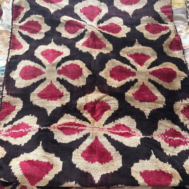 Beautiful hand woven silk velvet from Les Ottomans from Italy. The background is an aubergine color with ivory and fuchsia...
