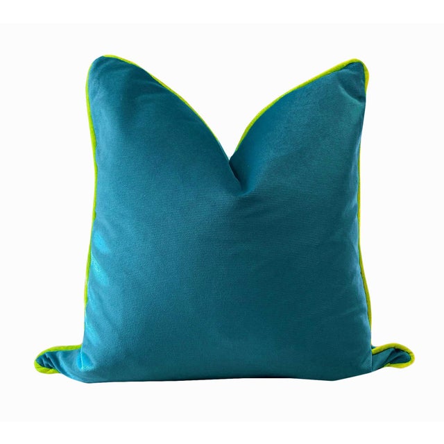 The vibrancy of this plush velvet speaks for itself. Colors are jewel-toned turquoise piped with chartreuse (yellow-...