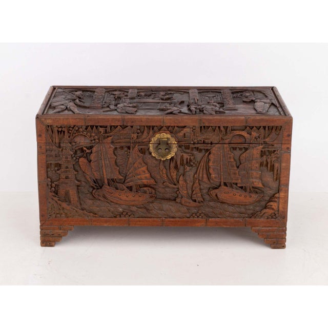 Chinese Figural Carved Camphor Wood Chest. 20" H x 36" W x 18" D. Provenance: From an Upper West Side, New York City Estate.