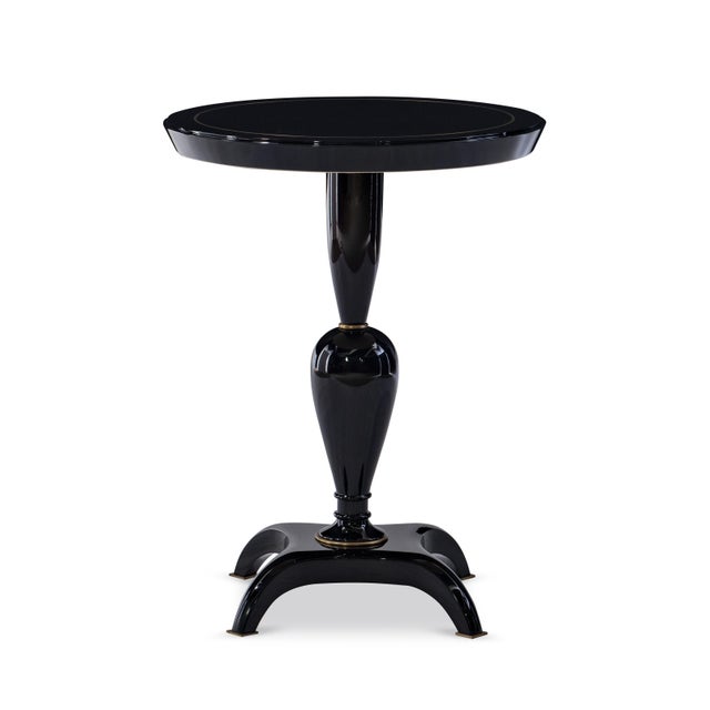 This ebonized pedestal accent table captures the essence of refined classicism with a modern sensibility. The sleek, round...