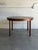 This extendable round dining table features a minimalist silhouette and sturdy tapered legs. In style of Bertil Fridhagen,...