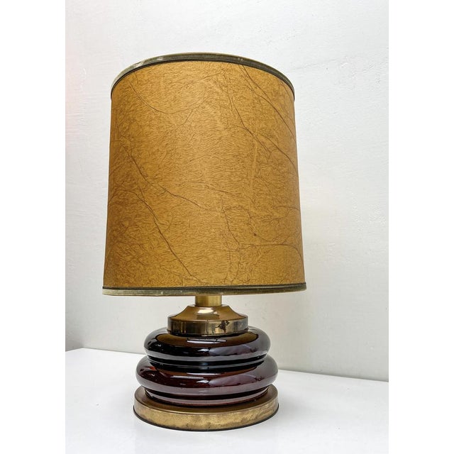 Modernist vintage table lamp Italian Design 1970s. A great and rare lamp with brown glass "Bubbles" and brass details, the...