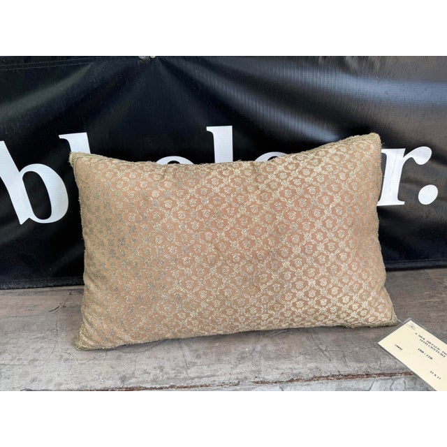 An elegant 18th century French silk pillow woven with metallic threads, showcasing a refined lattice medallion pattern...