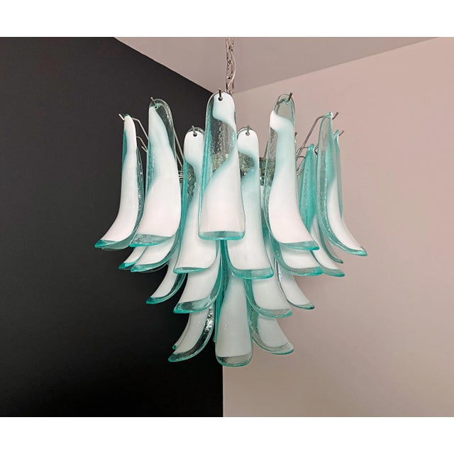 ELECTRICAL SYSTEM ADAPTED FOR US/AU/EU Murano Italian glass chandelier. Fantastic chandelier with turquoise and white...
