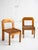 A set of 4 Post Modern Italian dining chairs constructed of solid pine. Seats are made of individual wood slats. Sources...