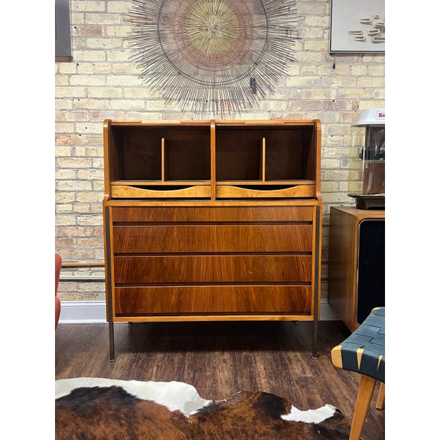 1950s. Made in Sweden. Roll top dresser with multiple drawers for storage.