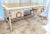 A coastal style desk by Designer Charles Hart. The desk's textured finish evokes the feel of sand on the beach, and the...