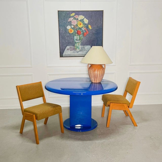 Circa 1970’s round dining table professionally restored and lacquered in a glassy Yves Klein Blue. The round base and top...