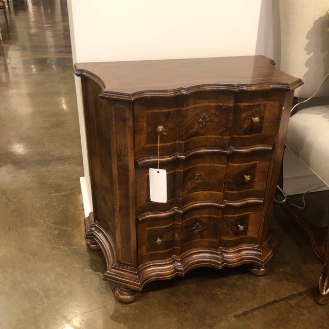 Wooden 3 drawer night stand with maple and walnut inlay, serpentine shaped front, brass hardware, bun feet and heavy base...