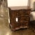 Wooden 3 drawer night stand with maple and walnut inlay, serpentine shaped front, brass hardware, bun feet and heavy base...