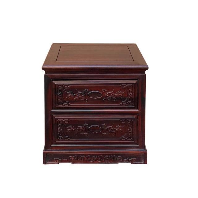 This is a simple oriental flower carving accent end table/nightstand/lamp table stand in reddish brown color with a...