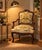 A beautiful louis xv style armchair with armrests, crafted from dark-stained carved walnut, dating from the 18th century...