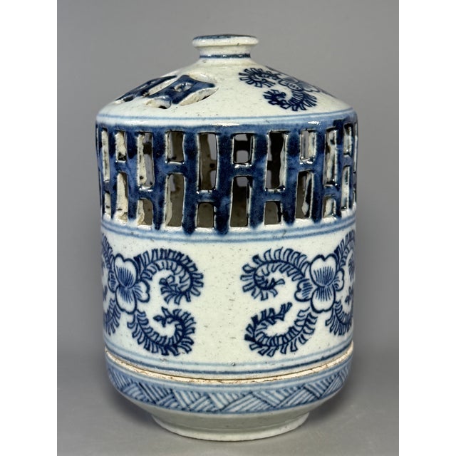 This vintage‑style Chinese blue‑and‑white porcelain censer comes with detachable construction. Its upper section features...