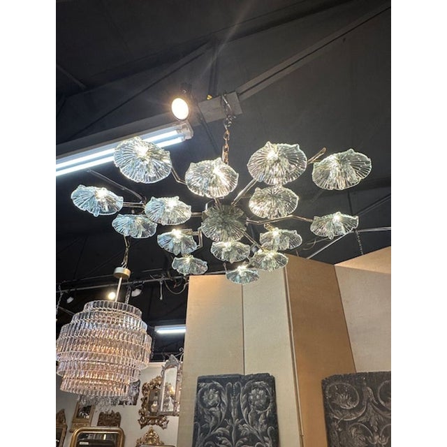 Modern Murano flower disc flush mount chandelier in Fontana green. The chandelier has been professionally rewired, comes...