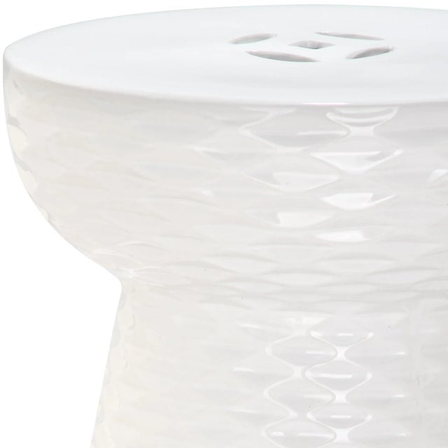 The ceramic garden stool in white ceramic is designed with perfectly flat top so it will also double as a side table....