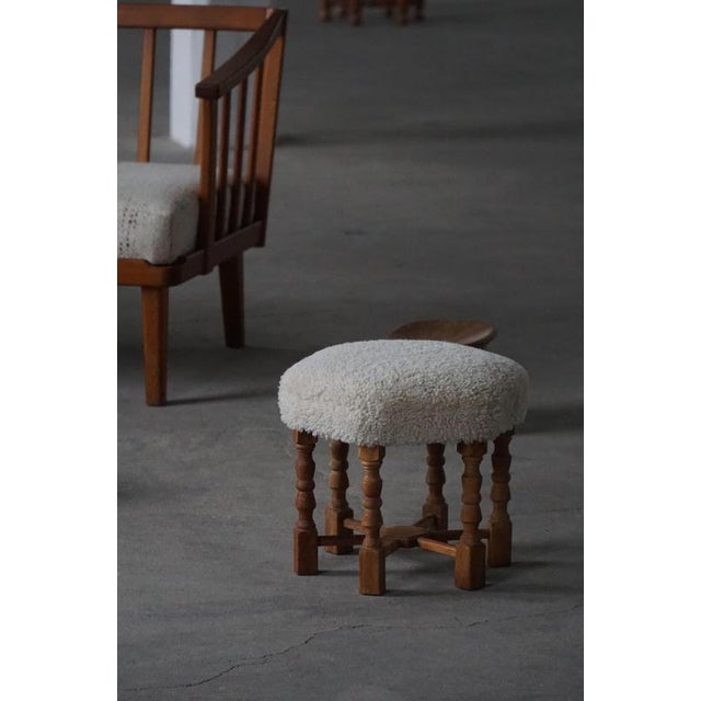 This elegant pair of stools is a refined example of Danish Modern design, crafted by a skilled Danish cabinetmaker in the...