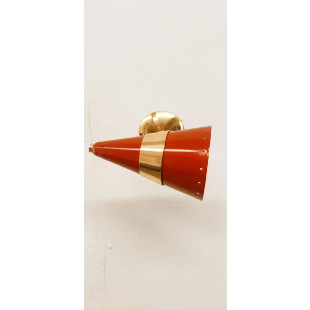 Red & Gold Adjustable Cone Sconce, in Very Good conditions. Designed 1970 to 1979 Up to 250V (Europe/UK Standard).The...