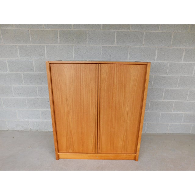 Jesper Danish Modern Teak Armoire Fitted Interior Chest Enclosed with 2 doors, 6 drawers, and 3 adjustable shelves Very...