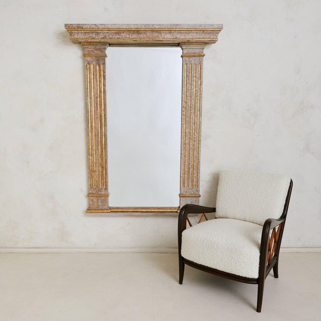 A 1950s French wall mirror, salvaged from the wings of a provincial performance theater. Standing just over five feet...