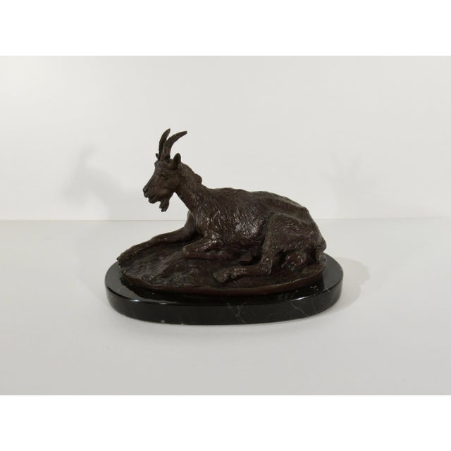 This artwork "Chevre Allongee (Reclining Goat)" c. 1860, is bronze sculpture after renown French artist Antoine Louis...