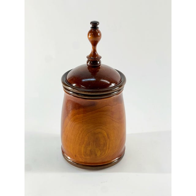 A very handsome vintage large hand turned solid wood tobacco urn. The large finial handle is a beautiful detail but the...