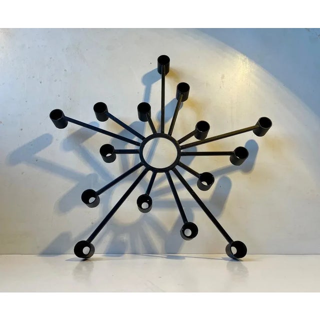 Large 1970s Brutalist - sculptural iron candleholder for up to 15 regular sized candles. Made in Denmark by the metal-art...