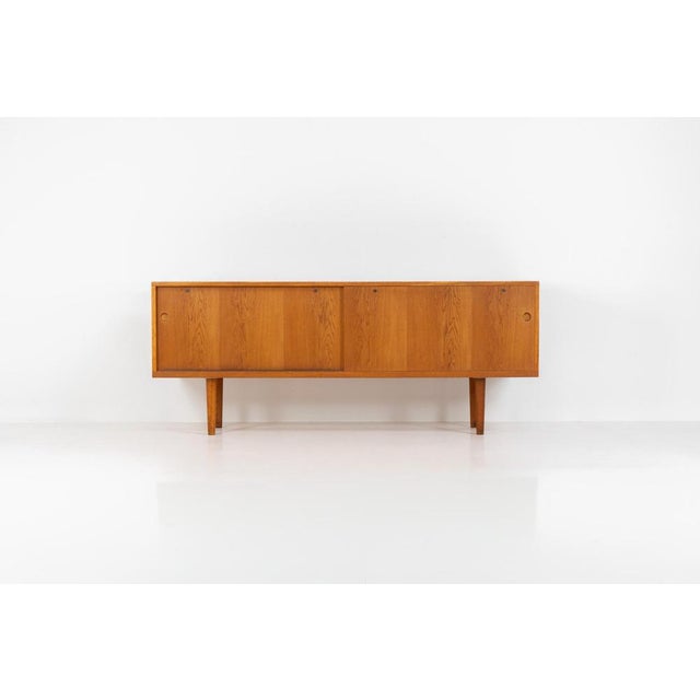 Rare and important ry26 sideboard by hans j. Wegner for ry møbler (denmark, 1950s). This incredible piece is composed of...