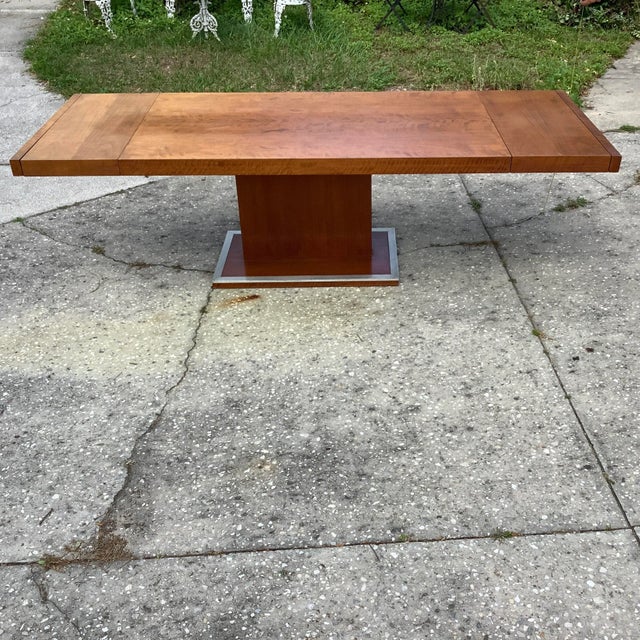 Authentic MCM Milo Baughman dining room table with two 16 inch leaves. Labeled Founders, see photos. Chrome rimmed base,...