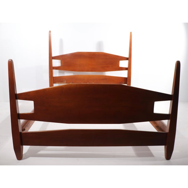 Rare and unusual full size Cushman Maple bed, design attributed to Herman DeVries. The bed is in very fine, original...