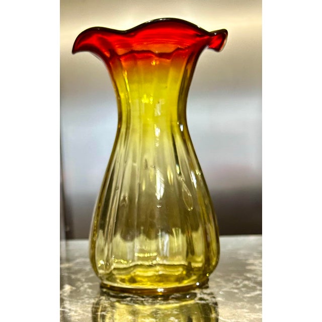 Amberina art-glass was known for its distinctive coloring, gradient from red to amber, a process that was developed in the...