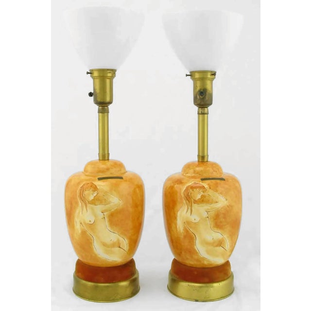 Pair of Sèvres Porcelain hand-painted table lamps with two part brass and umber velvet base. The hand-painted and glazed...