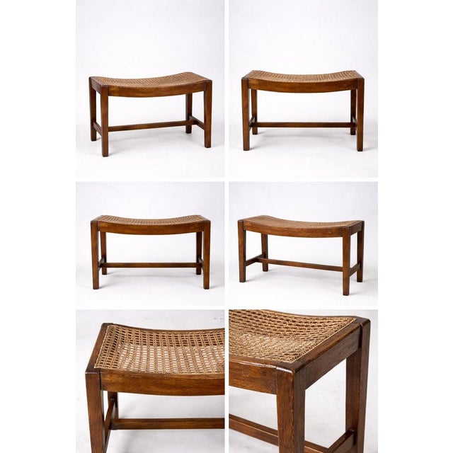 A beautifully simple antique oak stool with a hand-woven rattan seat, traditionally crafted and believed to have been...