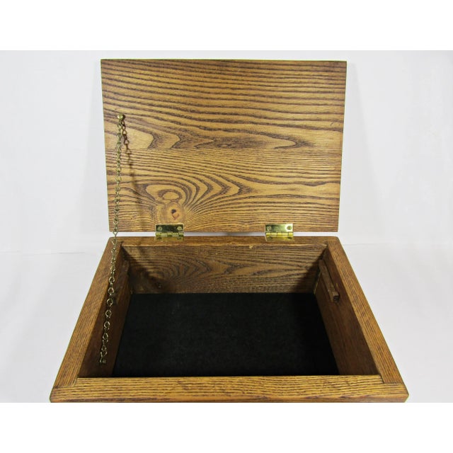Discover the craftsmanship of this vintage oak wood jewelry storage box. Handmade with precision, it features brass metal...