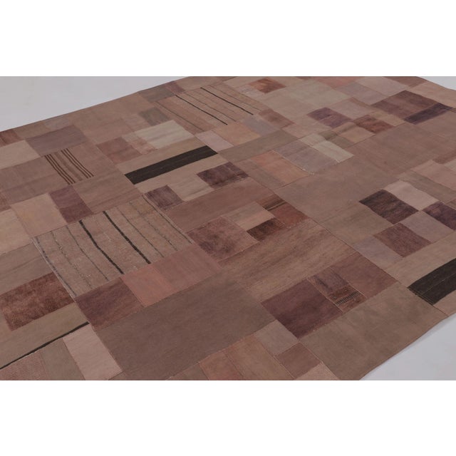 Handwoven in wool and cotton and originating circa 1950–1960, this 8x10 vintage turkish textile is a refined addition to...