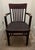 An authentic, early 20th-century antique banker's or courthouse armchair manufactured by the legendary Heywood-Wakefield...