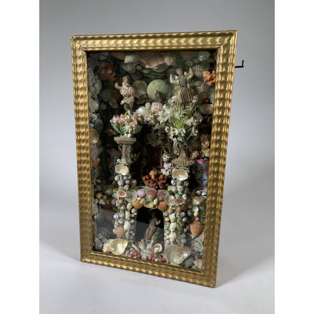Diorama under glass, known as "Paradise," 18th century A rich and complex composition of seashells, coral, porcelain, and...