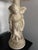 Elevate your space with classical Hollywood Regency grandeur. This striking multi-figure table lamp was manufactured by...
