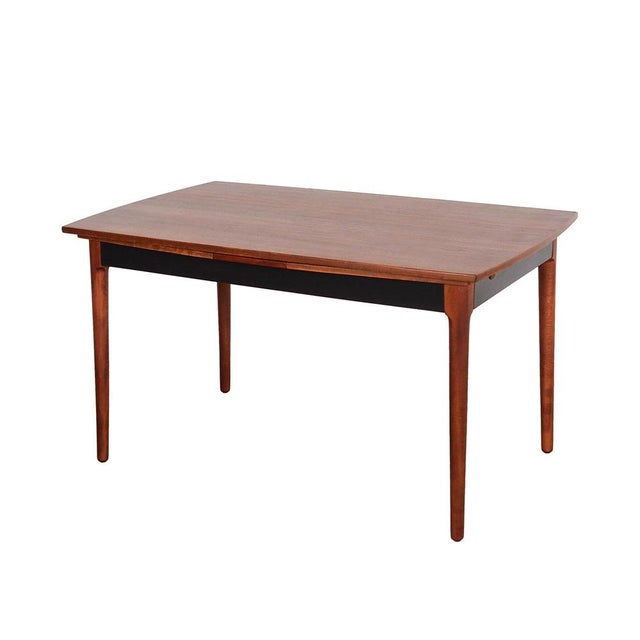 The table was made in the 1970s in Denmark. The frame and tabletop are covered with walnut veneer. The legs are made of...