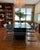 Set of six MG5 dining chairs, Italy, circa 1980s. Featuring polished tubular chrome frames with integrated armrests and...