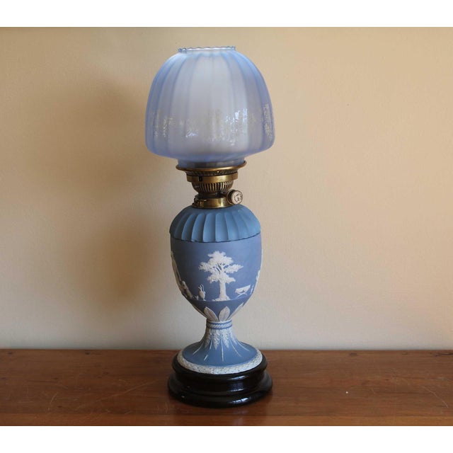 This exquisite elegant victorian oil lamp is from the famous wedgwood potteries of staffordshire , england in the renowned...