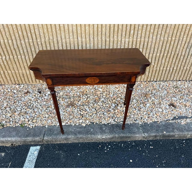 Antique Federal Sheraton Style Inlaid Flame Mahogany Folding Top Card or Gaming Table. Well made with inlays, turned legs...