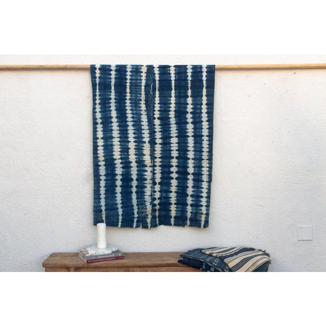 Hand-woven by master weavers of the Mossi and Dioula traditions in Burkina Faso, West Africa, these vintage textiles are...