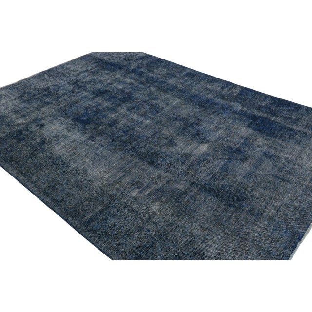 From our new collection of overdyed rugs, a vintage 8x11 Persian rug originating circa 1970-1980 or possibly earlier. On...