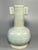 Beautiful antique Chinese celadon porcelain vase with two tubular ears on the neck. Smooth pale‑green glaze with subtle...