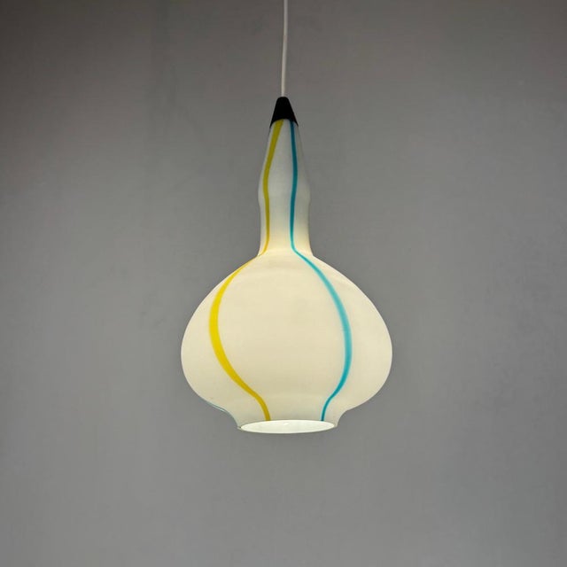 Mid-Century Modern Multicolor Murano Glass Pendant Lamp from Stilnovo, Italy, 1950s This piece is designed in the style of...