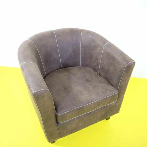 Brown Leather Armchair with Exposed Stitching and Wooden Legs